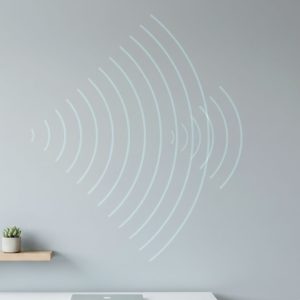 Minimalist design showing a wall absorbing sound waves, representing soundproof drywall solutions.